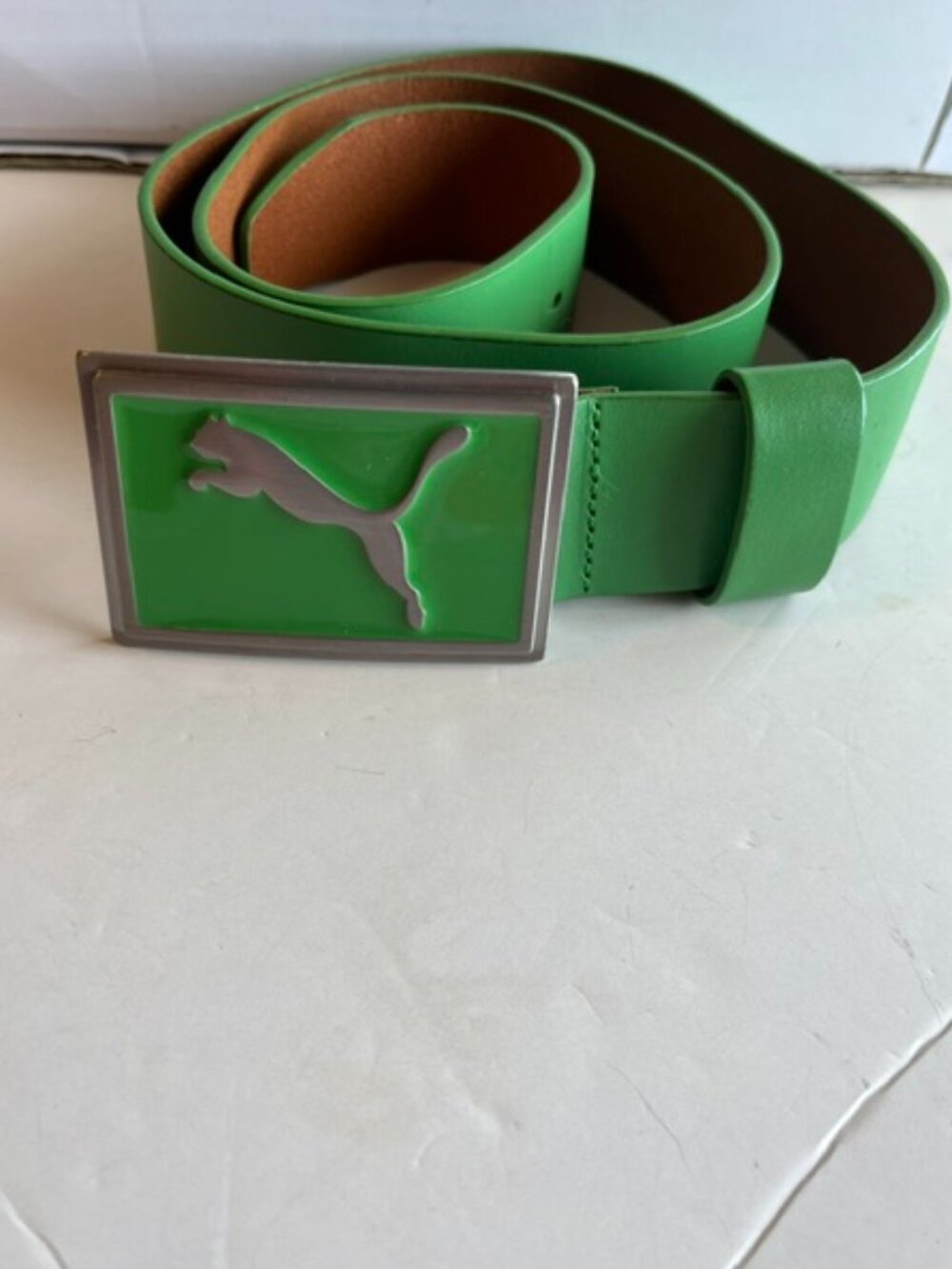 Green Puma men’s top leather belt.